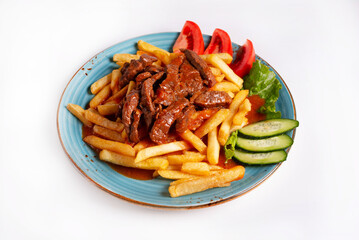 potatoes with meat and fresh tomatoes and cucumbers on a white background