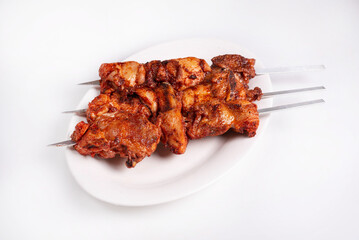 chicken meat kebab on a white background