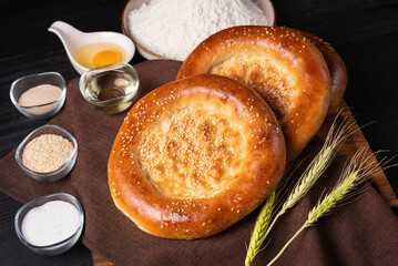 Tortilla is a baked product made of dough, round and flat. Traditional bread of the peoples of Central Asia