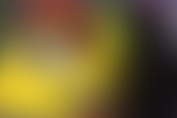 Black and yellow abstract blurred background. Blurry dark wallpaper. Dark black and yellow minimalist gradient background.