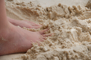 feet in the sand