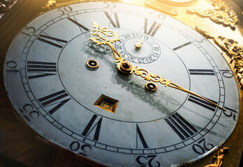 Close up old antique classic clock. Concept of time, history, science, memory, information. Retro style. Vintage watch, clock background. - obrazy, fototapety, plakaty
