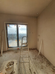 Building renovation. Brick walls. Plaster on the walls. Lining electrical cables