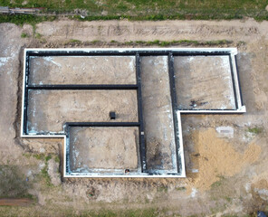 A drone view of the foundation of a new house. Construction of a new house.