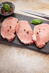 pork raw meat cuts steak slices fresh snack meal food snack on the table copy space food background rustic top view