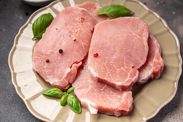 pork raw meat cuts steak slices fresh snack meal food snack on the table copy space food background rustic top view