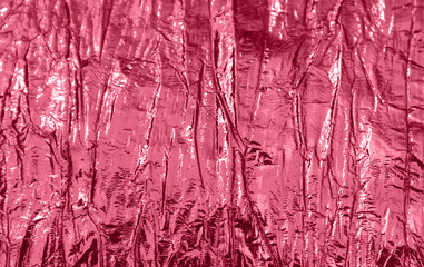 Holographic abstract magenta textured background.