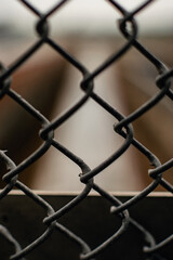 Fototapeta premium Chainlink fence bokeh