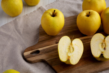 Raw Organic Golden Apples Ready to Eat, low angle view.