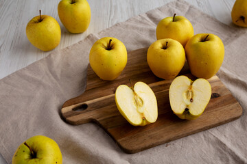 Raw Organic Golden Apples Ready to Eat, side view.