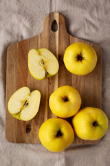 Raw Organic Golden Apples Ready to Eat, top view. Flat lay, overhead, from above.