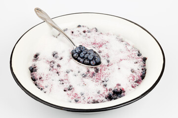 Traditional wild berry jam, blueberries in sugar.