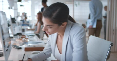 Business people,working in a corporate office, computer and staff in marketing and advertising office. Diverse corporate team collaboration together on project in the office, busy and company growth