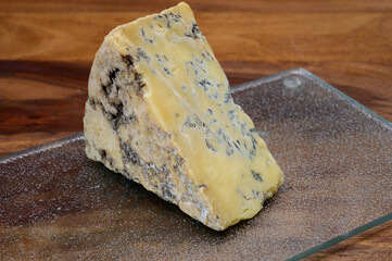 Cheese collection, English old stilton blue cheese close up