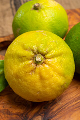 Fresh ripe bergamot orange fruits, fragrant citrus used in earl grey tea, medicine and spa treatments