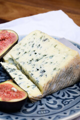 Cheese collection, piece of French blue cheese auvergne or fourme d'ambert