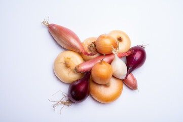 Onion collection, flat onion borretana from Spain, french Shallot, white and purple onion on white background