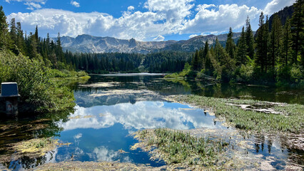 Pristine Sierras Crystal Clear Lakes with granite mountains and clouds