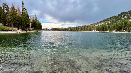 Pristine Sierras Crystal Clear Lakes with granite mountains and clouds
