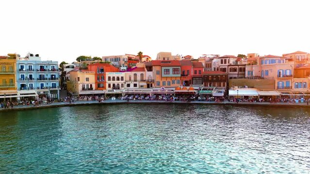 Aerial view of colorful houses and turquoise water in Greek island Crete. Chania panorama