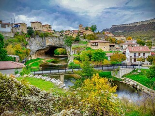 Fototapeta na wymiar Puentedey village is on a natural bridge over Nela river, Las Merindades, Burgos province, Castilla-León, Castille-Leon, Spain