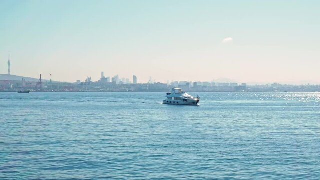 Yacht charter in Turkey. Boat sails in Bosphorus with Istanbul in the background