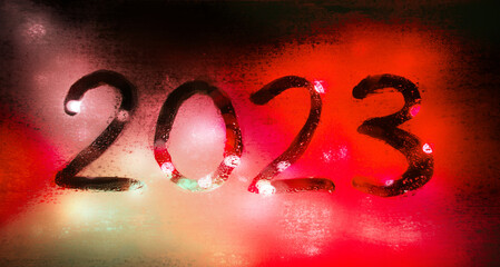 New year background of misted glass. 2023 numbers
