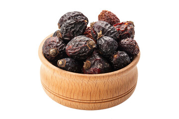 Heap of red dry rose hips in wood bowl isolated on a white background.