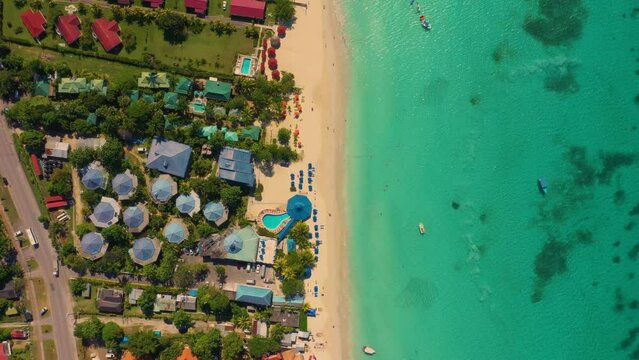 Aerial view of west coast of Jamaica.  Seven Mile Beach in Negril. The blue waters of the Caribbean Sea and the part of the island.