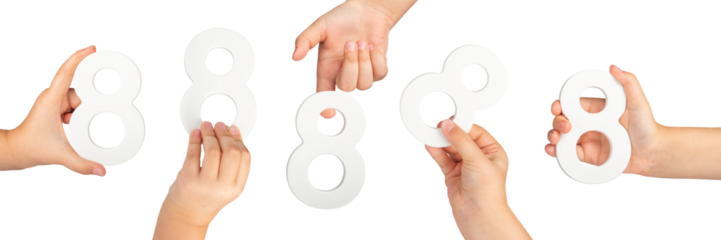 Number eight in hand isolated on black background. Number 8 in a child's hand is held on a black background. A large set of hands with the number eight to insert into a project or design.