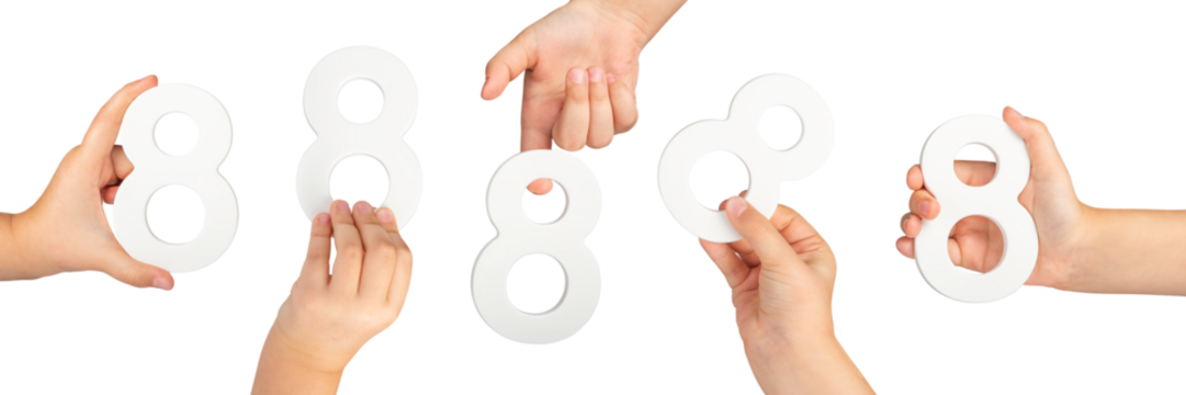 Number eight in hand isolated on black background. Number 8 in a child's hand is held on a black background. A large set of hands with the number eight to insert into a project or design.
