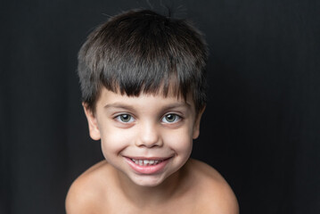 Cute adorable boy in the studio