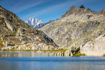 Alpine Lake at Oberalp Pass in Graubunden alps, Grisons, Switzerland
