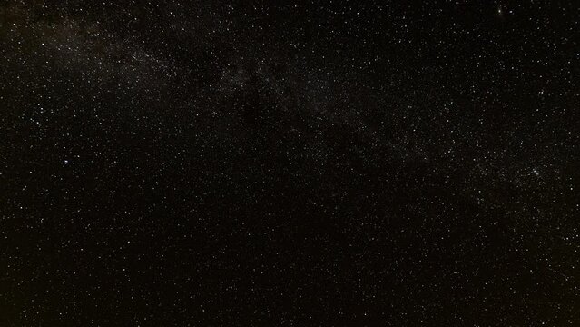 Shooting stars in night sky / Glen Canyon, Utah, United States