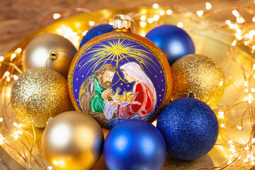 a large decoration for the Christmas tree with the image of the birth of Jesus Christ in Bethlehem....