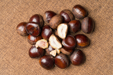 Fresh chestnuts on a monochrome background