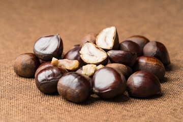 Fresh chestnuts on a monochrome background