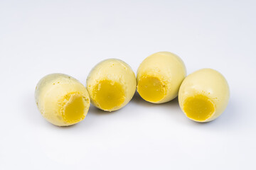 Fresh solid eggs on a pure white background