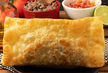 Focus on delicious meat pastel.