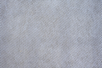 Rough metal silver colored plate with diamond shapes, as a graphic background
