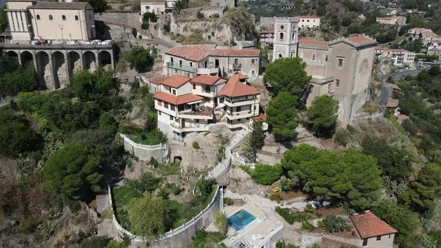 Orbit church and apartments on mountain side