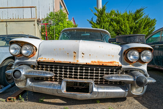 The grille of a white 1958 Cadillac at a scrap yard in Wells, Nevada, USA - June 18, 2022