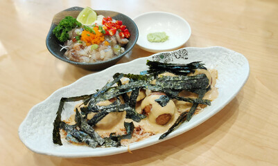 Japanese food, Tako Wasabi with Takoyaki is a Japanese snack in the shape of little round balls containing pieces of octopus