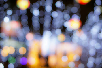 Fototapeta premium Blurred and bokeh of Christmas holiday lightings pattern background