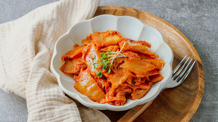 Kimchibokkeum, Stir-fried Kimchi : Well-fermented kimchi stir-fried with chopped green onion and garlic in a pan greased with oil, this is a popular side dish usually eaten with rice. It also goes wel