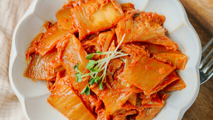 Kimchibokkeum, Stir-fried Kimchi : Well-fermented kimchi stir-fried with chopped green onion and garlic in a pan greased with oil, this is a popular side dish usually eaten with rice. It also goes wel