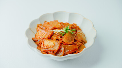 Kimchibokkeum, Stir-fried Kimchi : Well-fermented kimchi stir-fried with chopped green onion and garlic in a pan greased with oil, this is a popular side dish usually eaten with rice. It also goes wel
