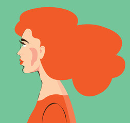 A young beautiful woman with red hair.