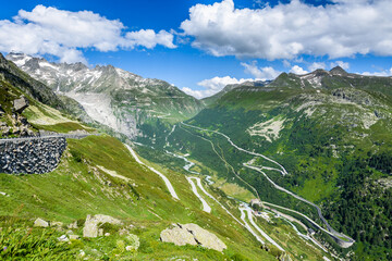 Winding pass road between Grimsel Pass and Furka Pass, Canton of Valais, Switzerland - obrazy, fototapety, plakaty