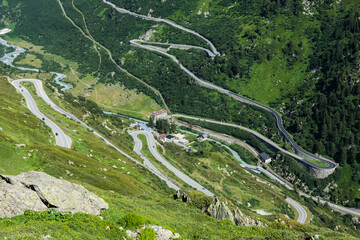 Fototapeta na wymiar Winding pass road between Grimsel Pass and Furka Pass, Canton of Valais, Switzerland